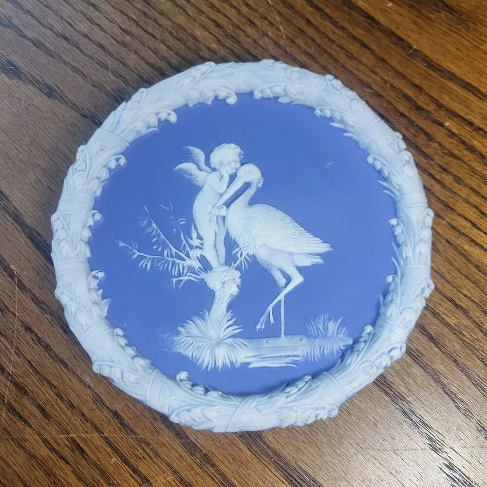 Schafer & Vater Blue & White Jasperware Plaque Featuring a Cherub & Stork Lily